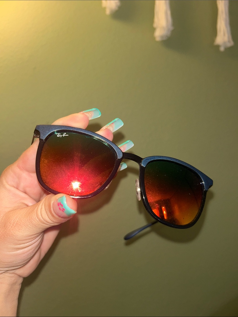 Ray-Ban Black Frame Sunglasses with Red-Orange Mirrored Lenses
